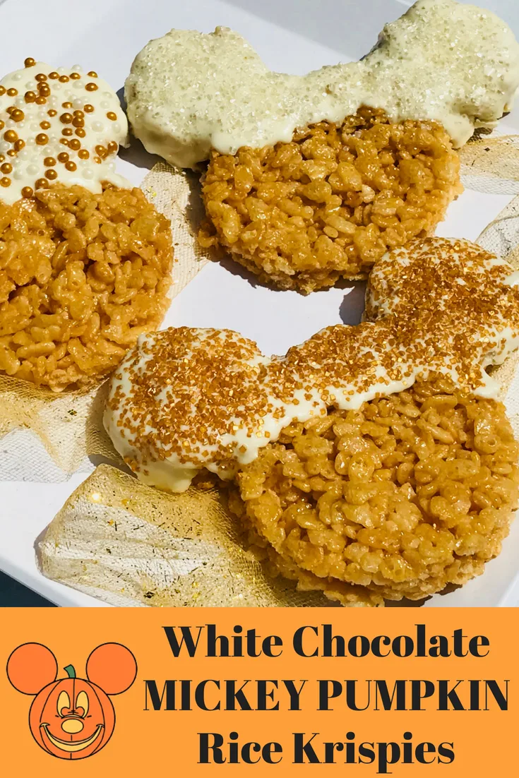 These White Chocolate dipped Mickey Pumpkin Rice Krispies Treats are perfect for Fall. They taste like pumpkin and you can let the kids help you decorate. Fun for a Halloween party too. #Halloween #HalloweenRecipe #DisneyRecipe #Mickey #RiceKrispies #FallBaking #FallRecipe