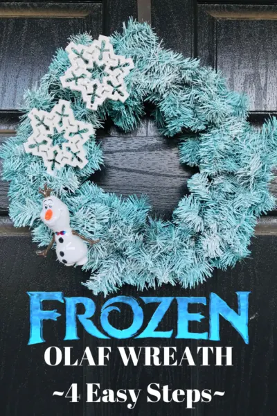 This cute Frozen Inspired Olaf Wreath Craft costs under $15 to make and it's a beginner craft with 4 easy steps. Perfect for the holiday season! #FrozenCraft #DIsneyMovieCraft #Frozen2 #Olaf #DisneyMovies #Wreath #DIY #WreathCraft