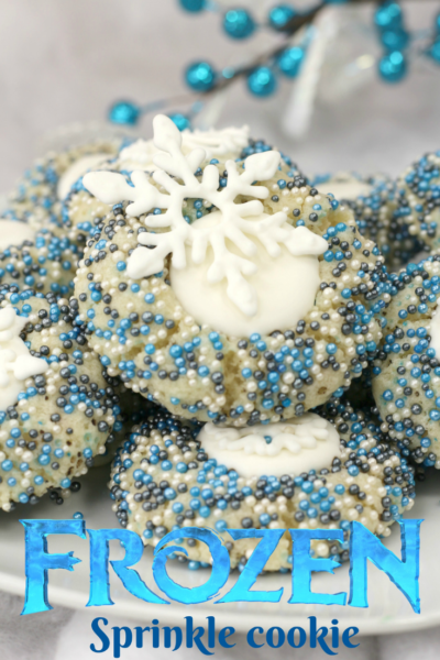 For a festive Christmas cookie, these sprinkle drop cookies are easy to make. They are snowflake cookies inspired by Disney's Frozen movie. #Frozen2 #DisneysFrozen #ChristmasCookies #DropCookies #HolidayBaking #DisneyRecipes