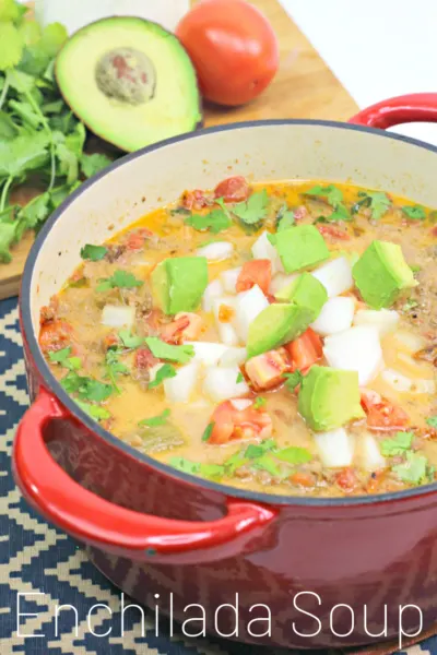 Enchilada Soup Recipe: This hearty one-bowl dinner is full of southwest flavor and the perfect winter meal idea. #Soup #SoupRecipe #EnchiladaSoup #SouthWestRecipe #MexianRecipe #Avocado #GrounBeefSoup #WinterRecipe