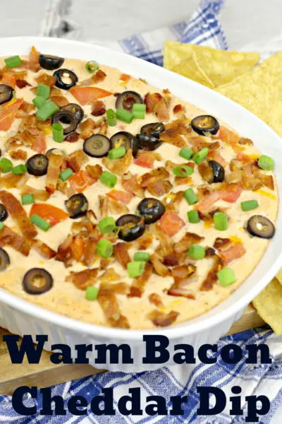 Warm Bacon Cheddar Dip: Perfect for tailgating or as any party food, this is an easy dip that everyone loves! It's warm and cheesy. #Dip #TailgatingRecipes #SuperBowlRecipes #HotDips #DipRecipes #Appetizers #PartyFood 