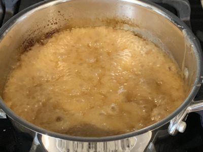Bringing caramel corn mixture to a boil