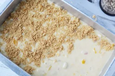 Spreading brown sugar topping. Spreading brown sugar topping.