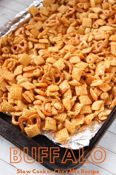 Looking for an easy Tailgating snack idea? This CrockPot Buffalo Chex Mix recipe is full of flavor and couldn't be easier to make. #ChexMixRecipe #SlowCooker #CrockPot #SnackMixRecipe #TailgatingRecipe #PartyRecipe