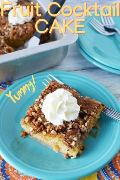 Fruit Cocktail Cake is a classic that's made with a can of fruit cocktail! It's got a spongy texture with a pecan topping and a brown sugar glaze that soaks through.