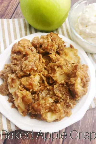 This easy Baked Apple Crisp recipe is perfect after a trip to the orchard. Made with Granny Smith apples and oats, it'll be your favorite! Just serve over ice cream. #Apple #AppleRecipe #AppleCrisp #FallBaking This easy Baked Apple Crisp recipe is perfect after a trip to the orchard. Made with Granny Smith apples and oats, it'll be your favorite! Just serve over ice cream. #Apple #AppleRecipe #AppleCrisp #FallBaking