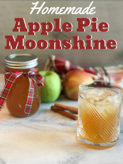 How to make your own homemade apple pie moonshine - the perfect fall cocktail. Makes a large batch, which is great for parties and holiday gift giving. #Moonshine #Cocktail #AlcoholicDrinks #ApplePie #AppleRecipe #AppleDrink #DIY #DIYGift #ChristmasGift #HomemadeGift #GiftIdea