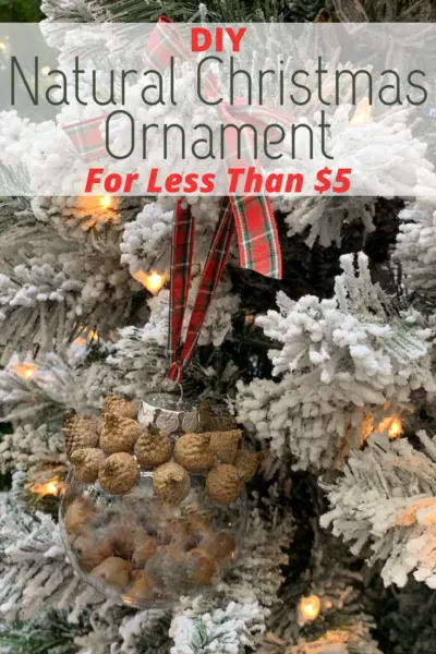 This DIY Natural Christmas Ornament is made from recycled material, acorns from the outdoors and costs less than $5 to make! #Christmas #DIY #Crafting #ChristmasOrnament #DIYChristmasOrnament #Holiday #ChristmasTreeDecor #OrnamentCraft