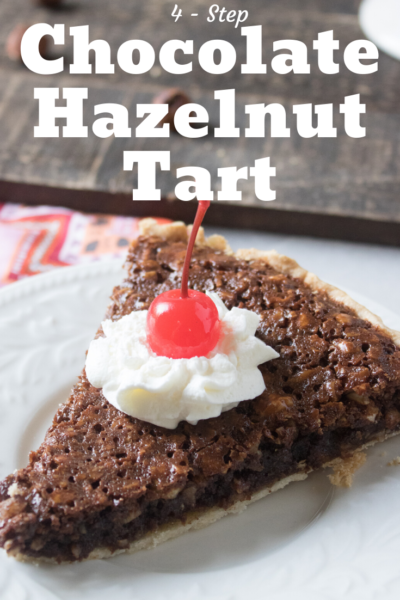This Chocolate Hazelnut Tart recipe comes together in 4 easy steps. It's the perfect Christmas Dessert idea that anyone can make! #Tart #Nutella #Hazelnut #ChocolateHazelnut #Baking #ChristmasDessert