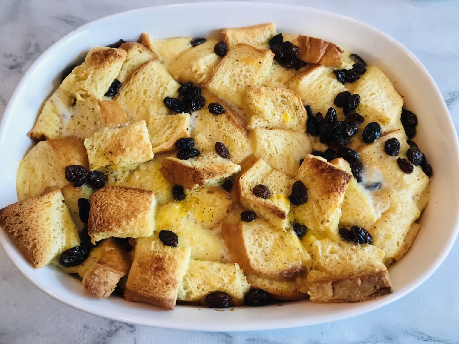 Easy Christmas Bread Pudding With Raisins And Brandy Sauce