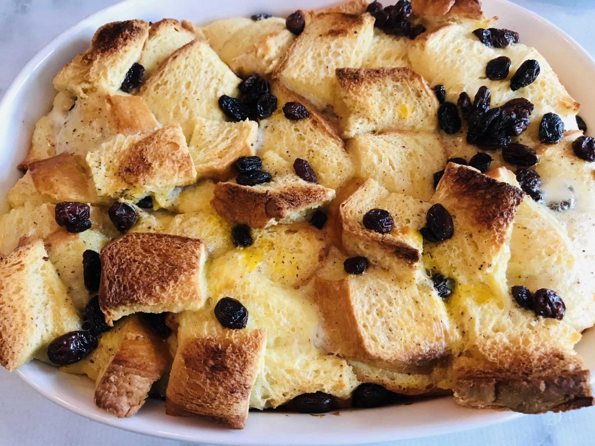 Easy Christmas Bread Pudding With Raisins And Brandy Sauce