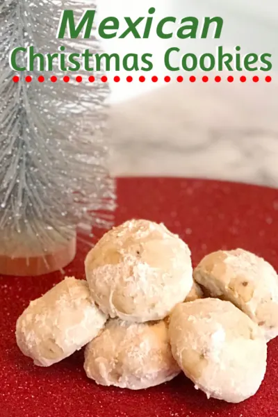 These Mexican Christmas Cookies (AKA - Mexican Wedding Cookies) are soft and nutty, then rolled in powdered sugar. They're delicious and easy! #ChristmasCookies #DropCookies #MexicanWeddingCookies #CookieRecipes #HolidayBaking #MexicanRecipes