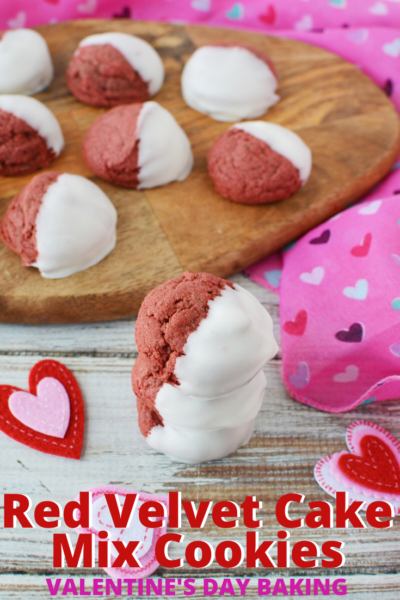 Make the perfect Valentine's Day treat with these dipped Red Velvet Cookies made from cake mix! #ValentinesDay #ValentinesBaking #RedVelvet #ValentinesDayTreats #Baking #Cookies #CakeMixCookies