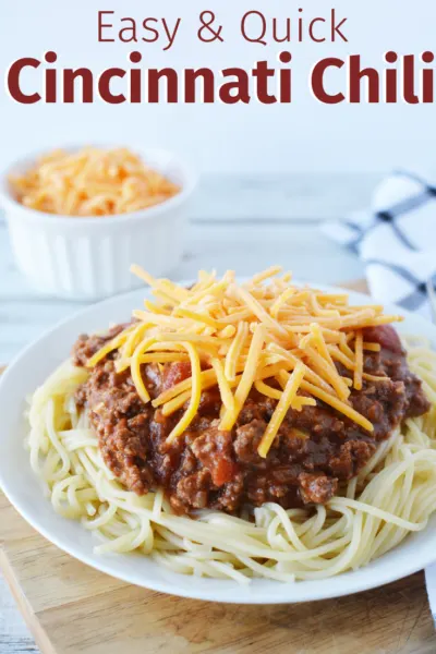 This classic dish is a family favorite! Make 3, 4 or 5 Way Cincinnati Chili with these easy recipe. It's an iconic Ohio dinner that's comforting and has a secret unsweetened chocolate ingredient for flavor! #Chili #CincinnatiChili #5WayChili #EasyChiliRecipe #ChiliRecipes #SuperBowlRecipes #WinterDinnerIdeas #WinterDinnerRecipes