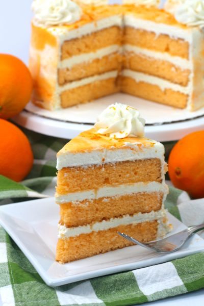 The perfect springtime dessert, this Luscious Layered Orange Cake is full of citrus flavor and topped with a buttercream frosting.