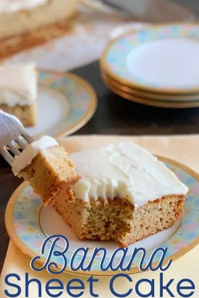 If you have leftover ripe bananas, you've got to make this delicious sweet Banana Sheet Cake recipe! It's topped with a cream cheese frosting and everyone asks for a second helping. #BananaRecipe #BananaSheetCake #BananaDessert #SheetCake