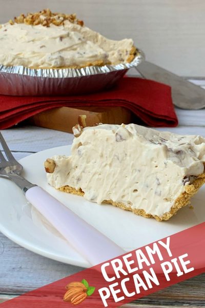 This No-Bake Creamy Pecan Pie recipe is an alternative to the classic! It's a decadent pie with flavors of maple and brown sugar with the crunch of pecans in a decadent filling. Perfect for Thanksgiving or in the fall. #ThanksgivingDessert #PecanPie #NoBakePie #EasyDessertRecipe #FallDessert #Maple