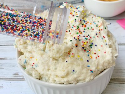 Garnish cake mix dip with sprinkles