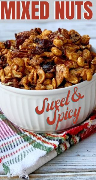 This Sweet & Spiced Mixed Nuts recipe is the BEST! It's a blend of cashews, roasted peanuts, pecans and dried cranberries that's baked with a sugar and spice blend.