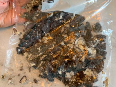 Crushing Oreo cookies in a bag