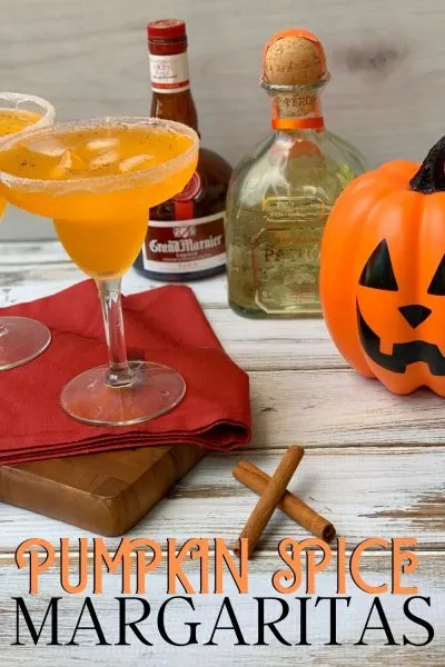 Ready for fall, but it's still hot? This Pumpkin Spice Margaritas recipe is the trick! They've got a smooth finish with the pumpkin spice flavor everyone loves. Perfect for Thanksgiving, Halloween or any fall festivity. #Margaritas #PumpkinSpiceMargaritas #HalloweenCocktail #ThanksgivingCocktail #FallCocktail Ready for fall, but it's still hot? This Pumpkin Spice Margaritas recipe is the trick! They've got a smooth finish with the pumpkin spice flavor everyone loves. Perfect for Thanksgiving, Halloween or any fall festivity. #Margaritas #PumpkinSpiceMargaritas #HalloweenCocktail #ThanksgivingCocktail #FallCocktail