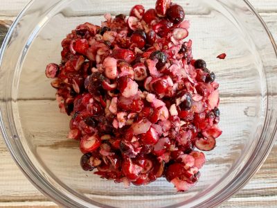 Cranberries marinating with pineapple juice and sugar