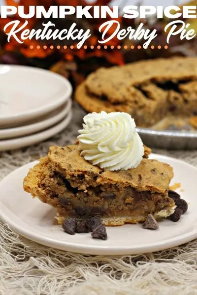 With a Pumpkin Spice twist, this Kentucky Derby Pie is a Thanksgiving dessert favorite! It has chewy texture with chocolate chips, pecans and bourbon. #PumpkinSpice #ThanksgivingPieRecipes #Thanksgiving #ThanksgivingRecipe With a Pumpkin Spice twist, this Kentucky Derby Pie is a Thanksgiving dessert favorite! It has chewy texture with chocolate chips, pecans and bourbon. #PumpkinSpice #ThanksgivingPieRecipes #Thanksgiving #ThanksgivingRecipe