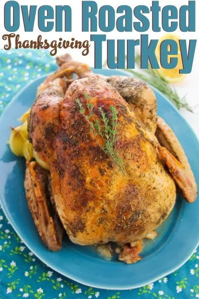 Thanksgiving Turkey Recipe: This classic oven roasted turkey recipe is easy-to-follow. It's a traditional turkey recipe, stuffed with citrus and herbs for flavor. Includes step-by-step directions and all of your turkey questions answered! #Thanksgiving #ThanksgivingTurkey #ThanksgivingTurkeyRecipe #RoastedTurkey #WholeTurkeyRecipe