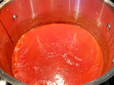 Bringing tomato basil soup to a boil
