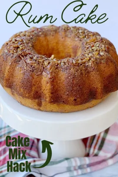 Made from a box of yellow cake mix, this Bacardi Rum Cake recipe is a classic! It's topped with a rum glaze and includes an optional chocolate ganache layer too. #RumCake #BoxCakeRecipes #YellowCakeMix #ChristmasDessert