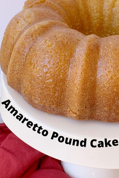 This boozy Bundt Cake recipe is a favorite! It's dense with amaretto liqueur baked in AND an amaretto glaze to finish it. #Amaretto #PoundCake #BundtCake #CakeRecipe