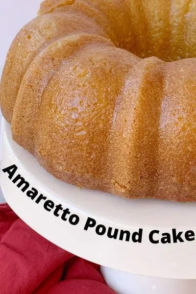 This boozy Bundt Cake recipe is a favorite! It's dense with amaretto liqueur baked in AND an amaretto glaze to finish it. #Amaretto #PoundCake #BundtCake #CakeRecipe This boozy Bundt Cake recipe is a favorite! It's dense with amaretto liqueur baked in AND an amaretto glaze to finish it. #Amaretto #PoundCake #BundtCake #CakeRecipe