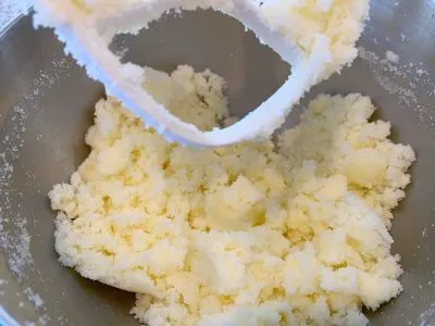 Beating butter and sugar in mixer Beating butter and sugar in mixer