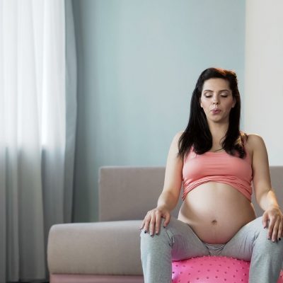 Inducing labor naturally with a yoga ball