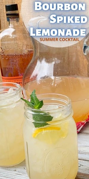 The perfect large batch party cocktail, this Bourbon Spiked Lemonade recipe is so refreshing with infused mint and ginger ale. #Bourbon #SpikedLemonade #CocktailRecipe #SummerCocktail