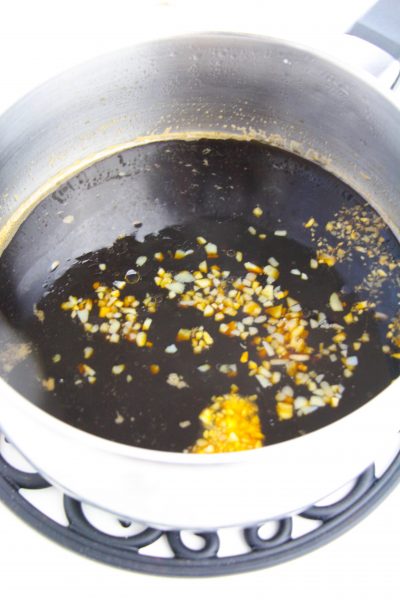Making Asian glaze in sauce pan for meatballs