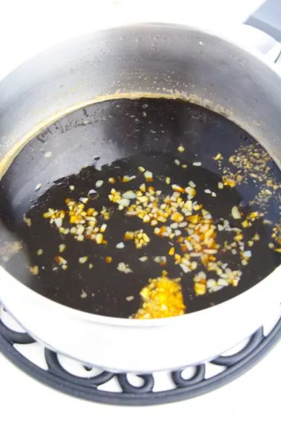Making Asian glaze in sauce pan for meatballs