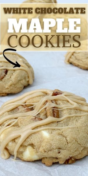 Light brown chewy cookies with pecans and white chocolate chip pieces, topped with a maple glaze.