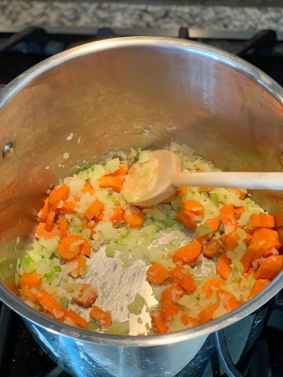 Cooking vegetables in stock pot