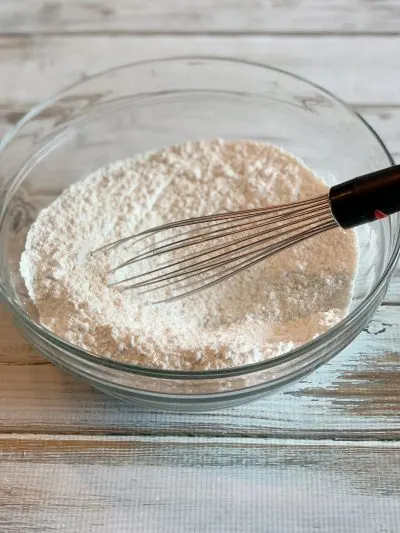 whisking flour, sugar and salt in a bowl