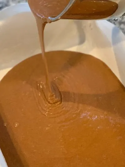 Pouring Cake Mixture Into 9x13 Baking Dish