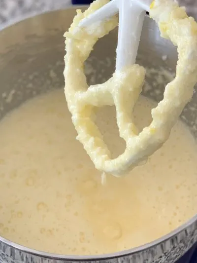 beating eggs together in stand mixer