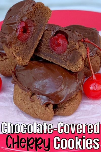 These Chocolate-Covered Cherry Cookies have a chewy cookie base, a maraschino cherry in the center then covered in fudge frosting. #CookieRecipe