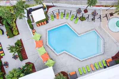 Pool area at Holiday Inn & Suites Across From Universal Orlando