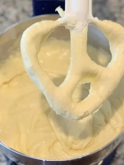 Lemon pound cake batter in stand mixer.
