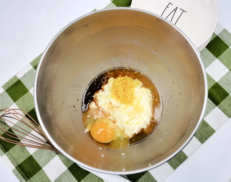 Egg, Lemon Juice, Lemon Zest and Vanilla In Mixing Bowl