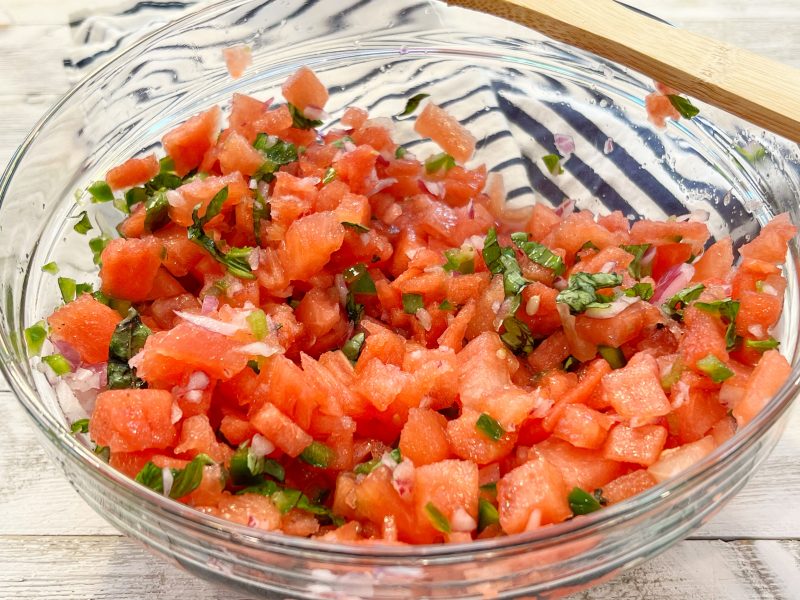 Watermelon salsa mixing