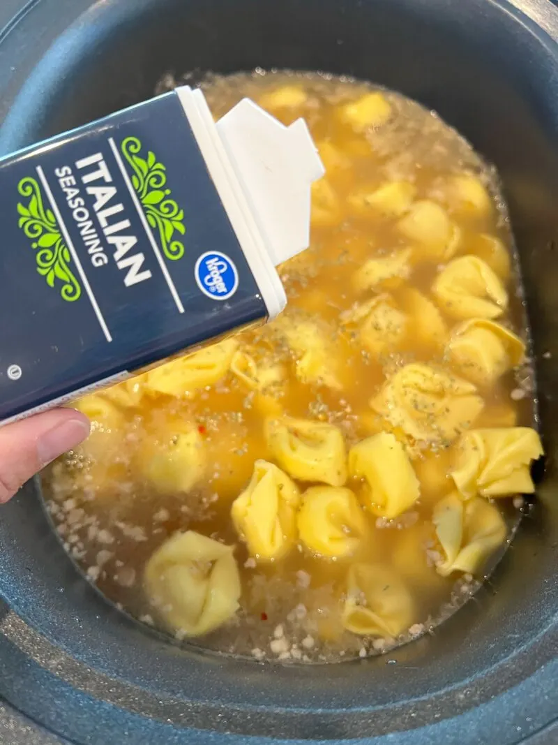 Making Tortellini Slow Cooker Soup