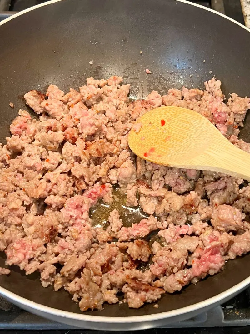 Browning Italian sausage in pan
