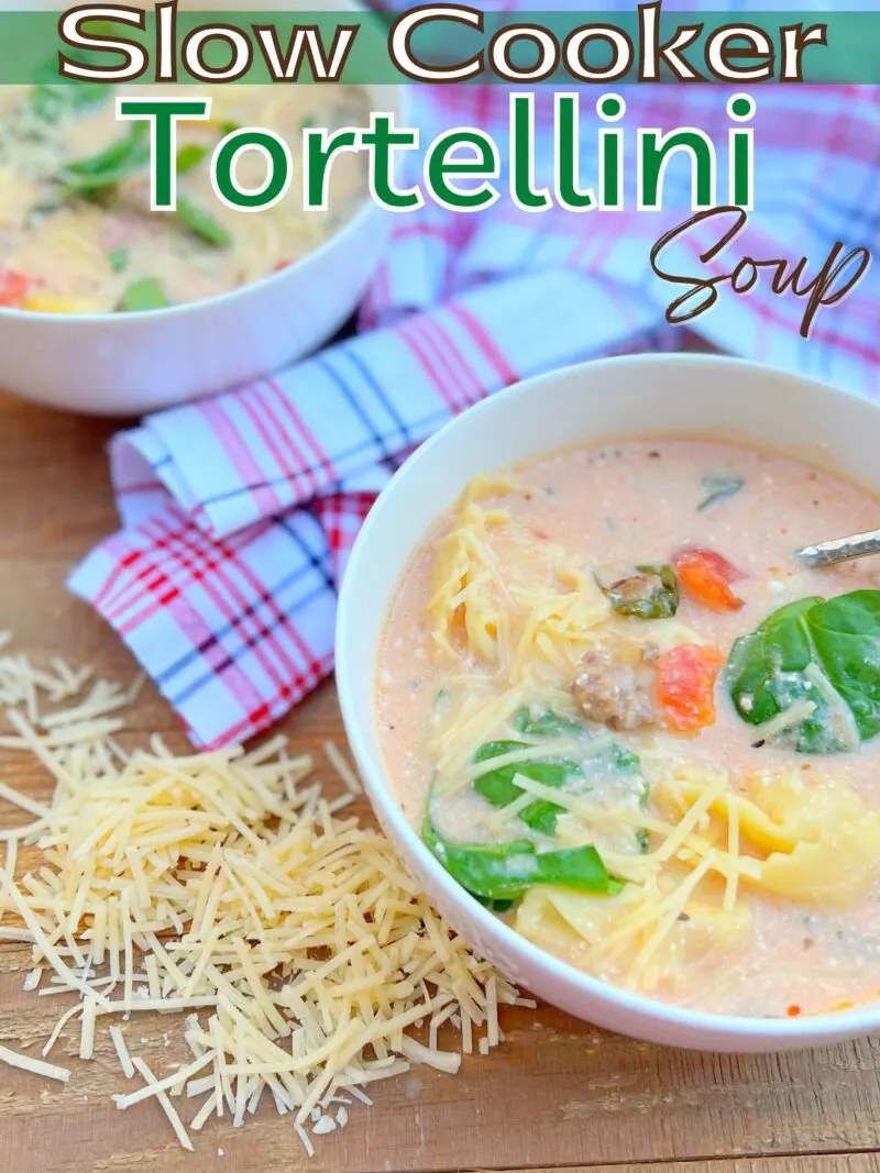 This Slow Cooker Tortellini Soup is full of flavor and so comforting! It has Italian sausage, fresh spinach, cheese tortellini, tomato and broth.